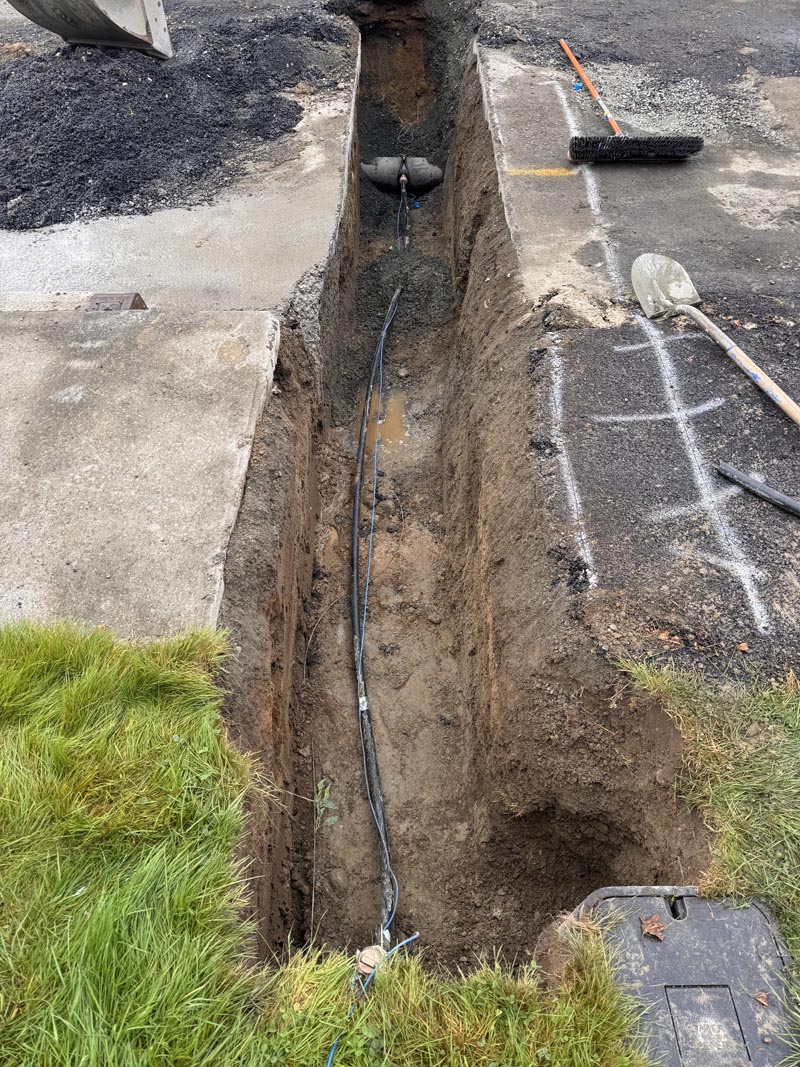 utility trenching for electrical lines with in-depth excavation