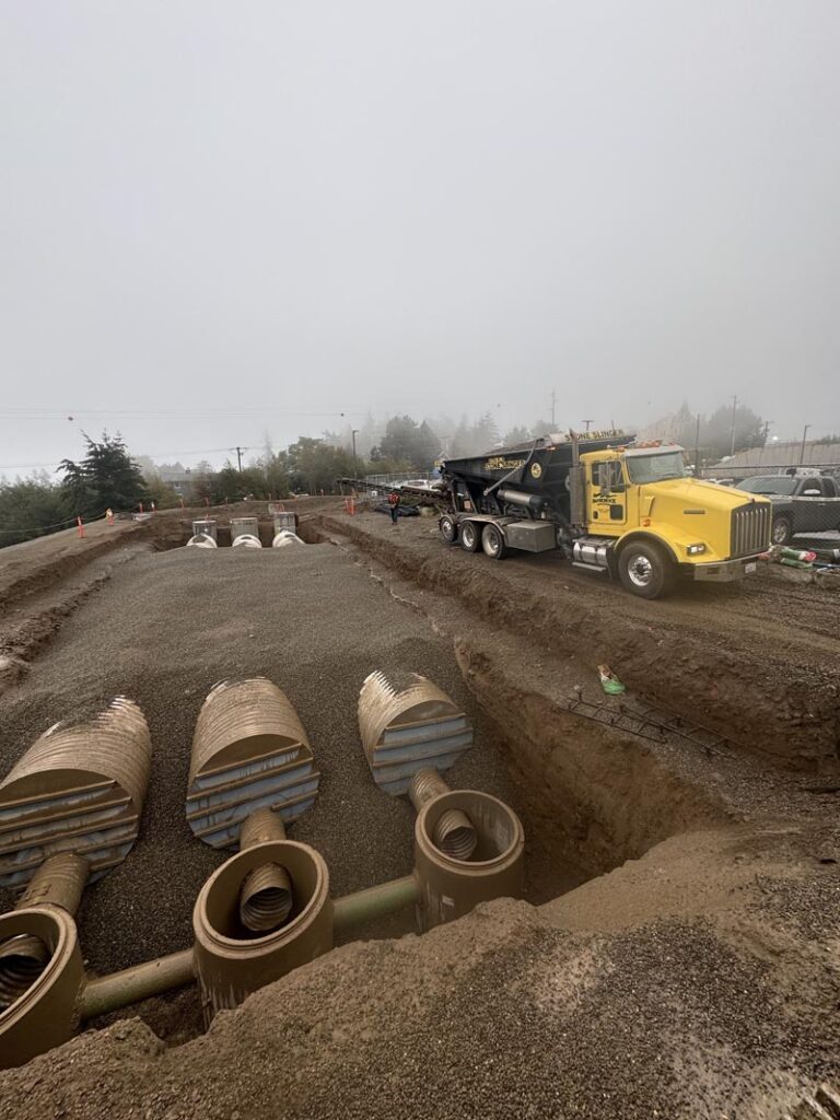 Completely backfilled detention vault pipes already connected to the main vault.